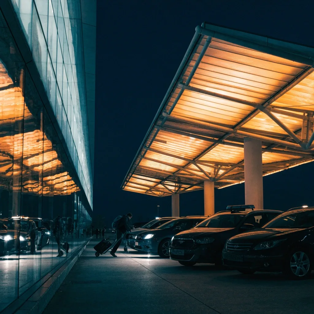 Pickup lane and terminal canopy at Brisbane Airport at night